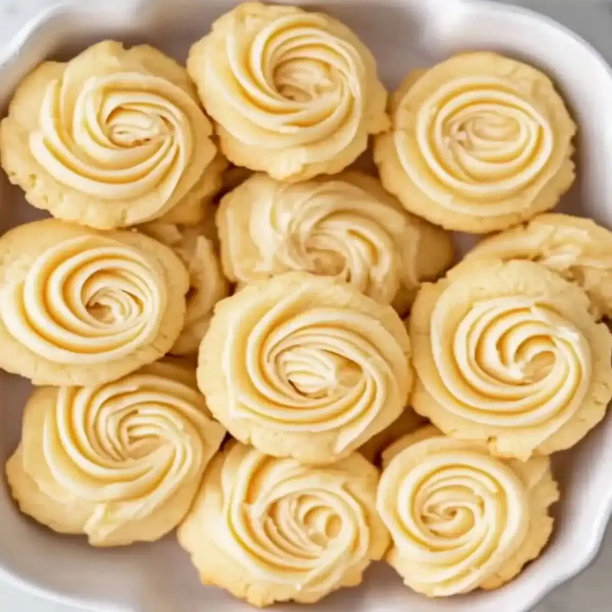 Golden butter cookies with a soft swirl pattern
