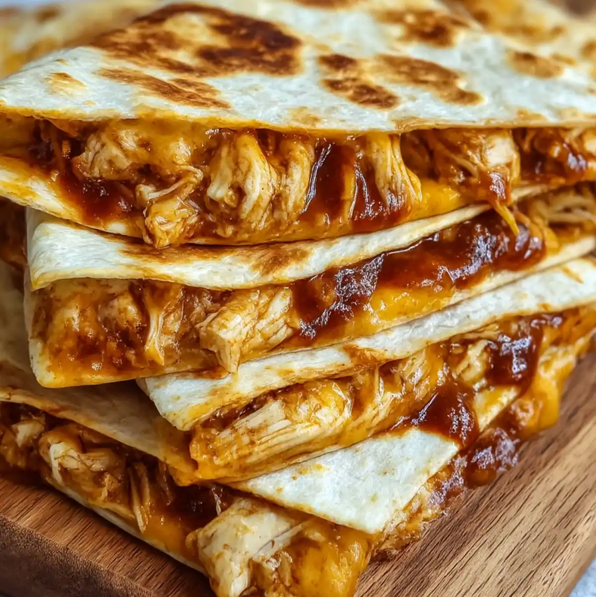 Cheesy BBQ Chicken Quesadilla with shredded chicken and tangy barbecue sauce.