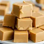 Homemade peanut butter fudge cubes with smooth creamy texture