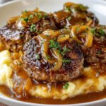 Hamburger Steak and Gravy – Easy Family Dinner Recipe 84 Juicy hamburger steak and gravy with caramelized onions served over creamy mashed potatoes.