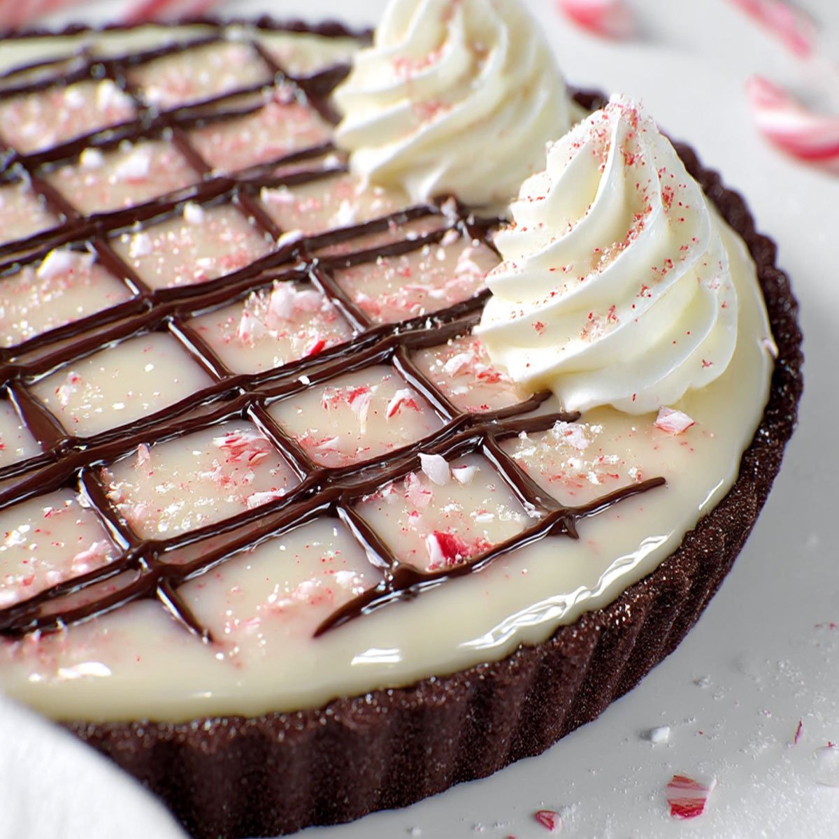 Candy Cane Pie Recipe – No-Bake Christmas Dessert 89 Candy Cane Pie with peppermint cream filling, Oreo crust, and chocolate drizzle